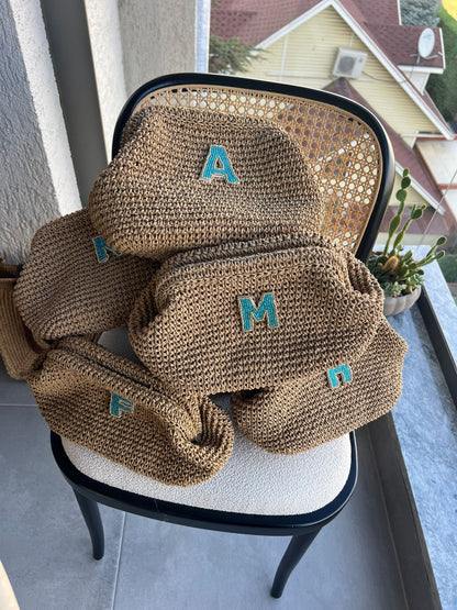 Initial blue clutch